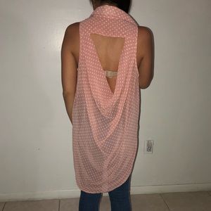 High low pink and white polka dot shirt